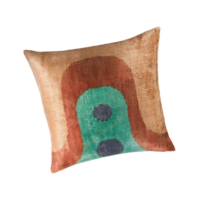 The Madonna Silk Velvet Ikat Pillow Cover channels timeless serenity with its bold yet minimal design. Earthy rust tones,...
