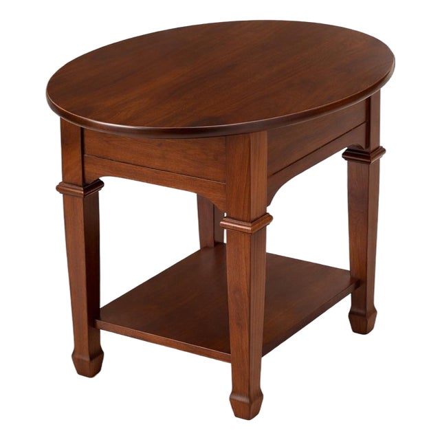 Late 20th Century Solid Wood Oval Side Table / Nightstand in Old Chapel Satin Walnut With Lower Shelf For Sale