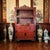 An antique Chinese red lacquer scholar cabinet, dating to the late Qing to early Republic period, executed in a...