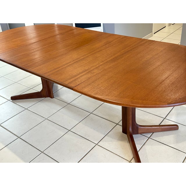 Extendable table designed by Niels Otto Moller for Mobelfabrik, Denmark, 1960s. This table is made entirely of high-...