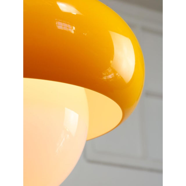 Diameter of this lamp is a whopping 50cm compared to the 35cm smaller more widespread model (lamp in orange colour). You...