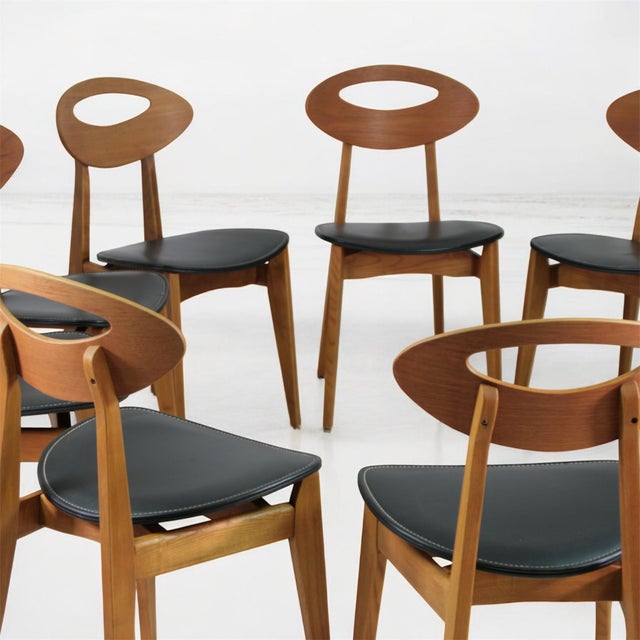 Timeless elegance and modernist design converge in this rare set of 10 chairs designed by roger landault for the french...