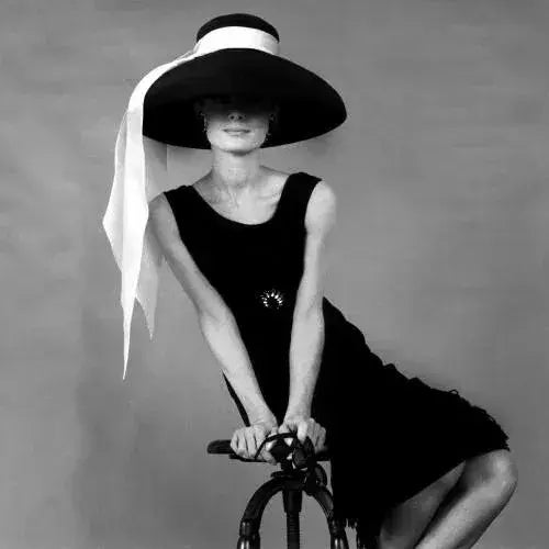 Audrey Hepburn in Hat for "Breakfast at Tiffany's" Audrey Hepburn posed in a wide-brimmed hat for her role in "Breakfast...
