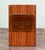 This mid century teak wood desk object features a recessed amber tone lucite plaque engraved with the Faravahar, the...