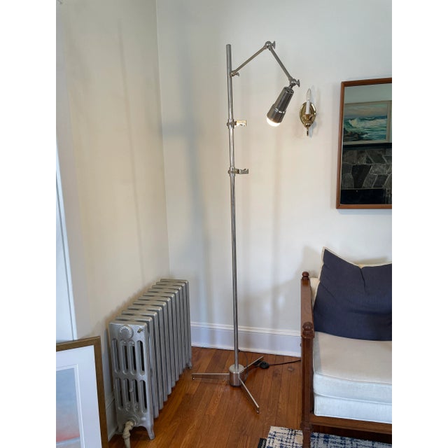 This floor easel lamp captures the spirit of Mid-Century Modern. This example is cast entirely in chrome, has adjustable...