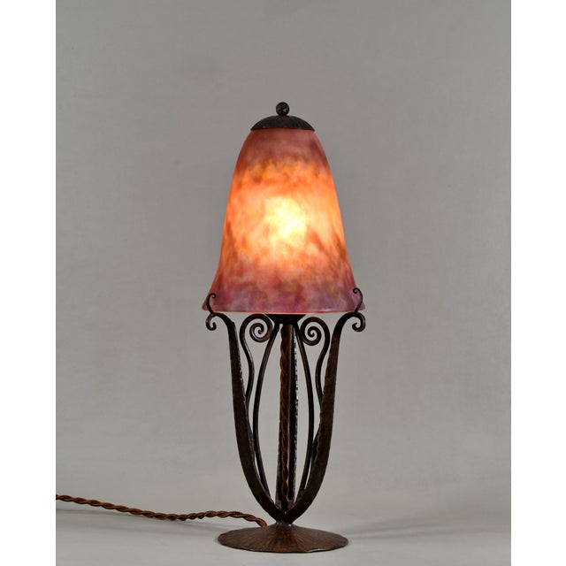Robj & Daum A 1925-30 French art deco lamp in wrought iron of excellent quality made for Robj. The nicely forged base...