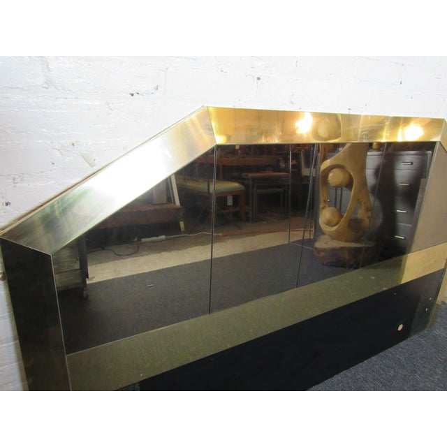 A mesmerizing headboard in the style of Paul Evans, this vintage piece is full of Mid-Century Modern extravagance that is...