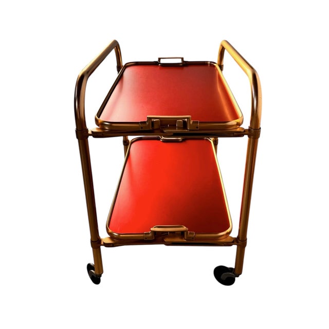 26 1/2”W x 27”H x 17 3/4”D A quintessential piece of British mid-century design, this Lumium bar trolley offers both style...
