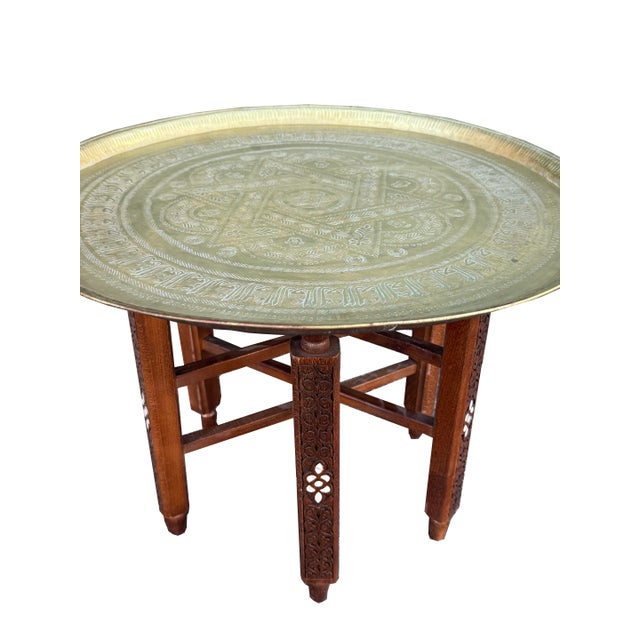 A stunning example of Middle Eastern decorative craftsmanship, this antique-style serving tray features a beautifully...