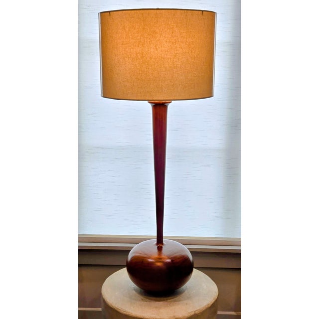 Large mid-century modern sculpted walnut table lamp by Light House Lamp & Shade Co., Los Angeles (Issue 35941). The walnut...