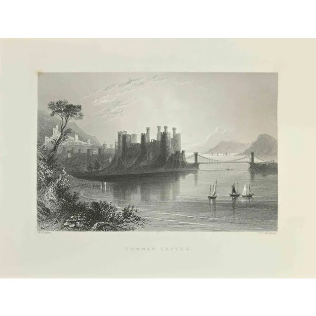 Conway Castle is an etching realized in 1845 by J.C. Armytage. Signed in plate. The artwork is realized in a well-balanced...