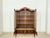 For sale is a magnificent and masterfully crafted display cabinet in the elegant Baroque style, a true highlight in any...