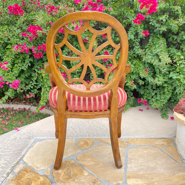Edinburg is accent chair in antique oak finish. Chair features hand-carved frame and accents. With a striped fabric on...
