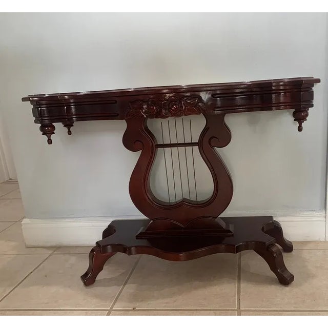 This is a beautiful and rich vintage solid mahogany end table with a Victorian Style. The table consists of one solid top...