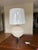 New in original packaging! Textured ceramic lamp with gold leaf accenting at base and finial. Sturdy, well-made piece adds...