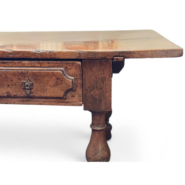 18th century European library, refectory, or tavern table crafted from rich, honey-toned walnut. Likely Spanish Baroque...