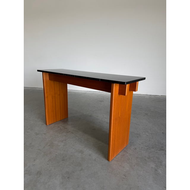 Vintage Danish Teak Console Table with black marble top with white veining. Perfect for your entryway, behind your sofa,...