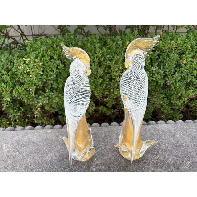 Pair Of Murano Glass Parrots. This lovely pair of Murano glass cockatiels, parrots or birds were executed in transparent...