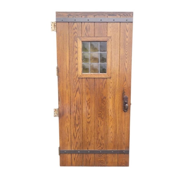 A fantastic large and heavy solid oak mission style reclaimed Gothic front door. Features a center window with tinted...
