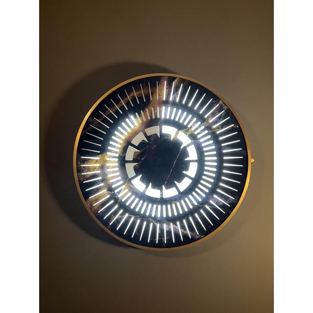 Black and gold marbled glass, created in the timeless colour combination of black and gold. Connects to our Tempus app...