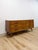 This vintage nine-drawer lowboy dresser by United is a classic example of mid-century modern casegood design, prized by...