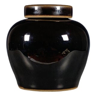 Black Glazed Porcelain Ginger Jar With Brown Rim and Unusual Glaze Break For Sale