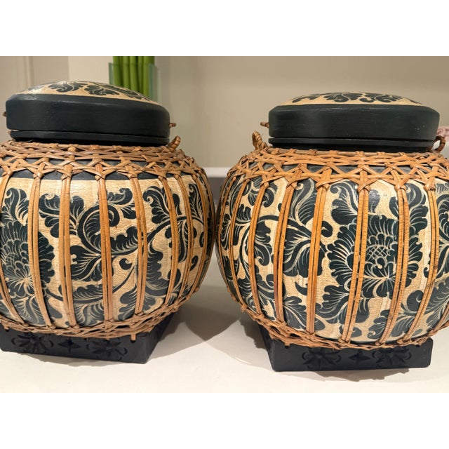 This is a decorative Thai rice basket, also known as a "Kratip" in the Thai language. • These baskets are traditionally...