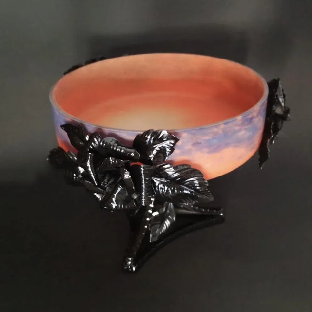 This table attachment from the Art Deco around 1920 years consists of a glass shell of SIG. "Degue" and an artistic iron...