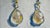Delicate pearl drop earrings are captured with rich impasto brushwork in this original oil painting. Thick, expressive...