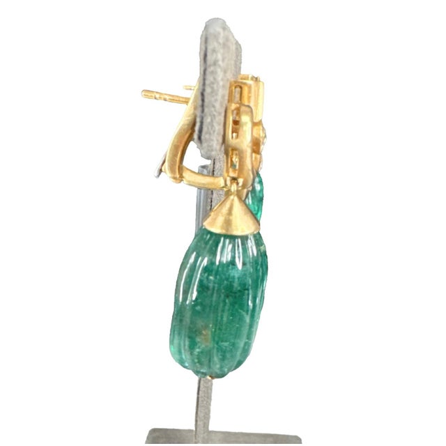 Elegant 21st Century 18K Yellow Gold Emerald and Diamond Drop Earrings. This exquisite pair of earrings is crafted in 18k...