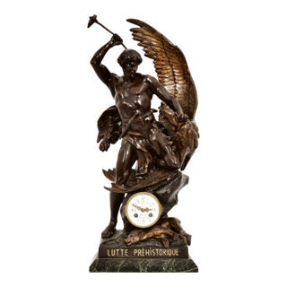 Patinated Bronze Figural Sculpture Clock "Lutte Préhistorique" by Emile Louis For Sale