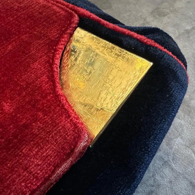 This is a truly spectacular vintage 1970s Italian shoulder bag, showcasing a rich combination of deep navy blue and...