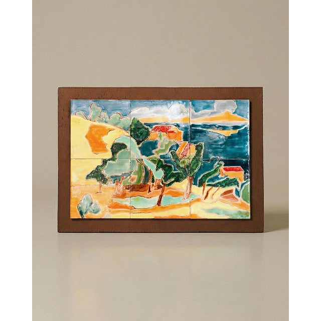A quintessential 1960s french tile panel, this vibrant and colorful piece depicts the picturesque surroundings of the...
