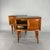 Pair of bedside tables with black glass and stiletto legs, designed in the 1950s. Structure in solid mahogany and veneer,...