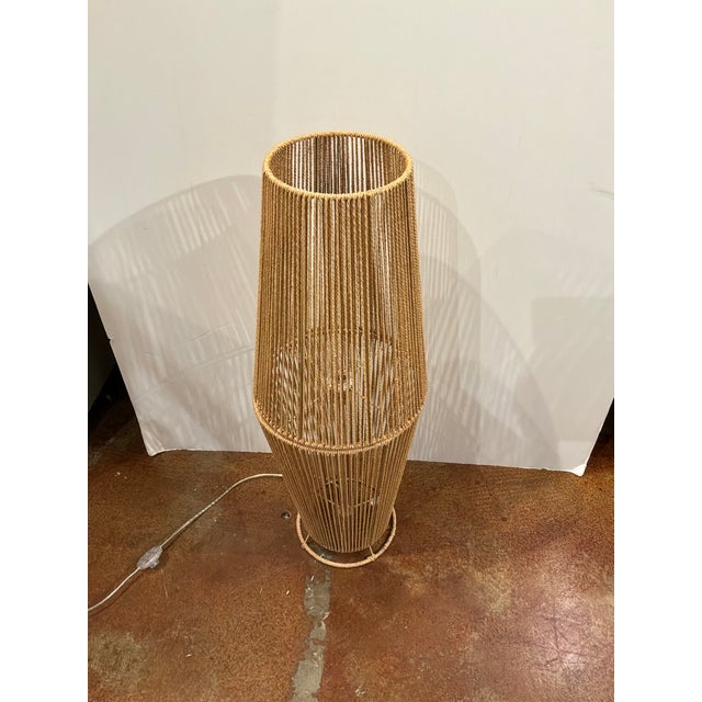 Stylish organic modern Large Braided String Lamp. One light. Camel color. Showroom floor sample.