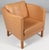 Arne Vodder lounge in original light beige leather. Legs of oak. Made by Nielaus, model AV59. Price per chair. This piece...