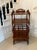 Antique Victorian quality mahogany free standing Canterbury whatnot having a quality pierced carved gallery top above two...