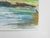 Late 20th century watercolor on paper riverside landscape painting. Signed illegibly lower right corner. Unframed.
