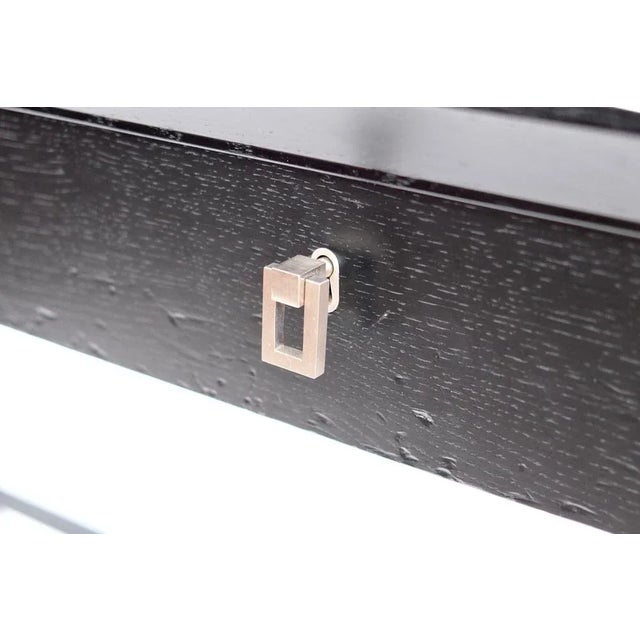 Desk with 2 drawers Fitting also serves as locking mechanism Blackened oak New Wiener Werkstätte Model: Amadé Austria,...