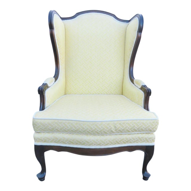 Early 20th Century French Upholstered Mahogany Wing Chair For Sale