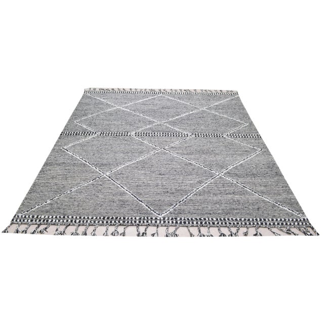 Moroccan Beni Ourain hand knotted rug with natural colors, contemporary style and soft texture.