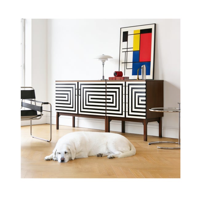 Sideboard consisting of two modular cabinets; one wider, two-door with a wooden shelf inside, the other with four drawers....