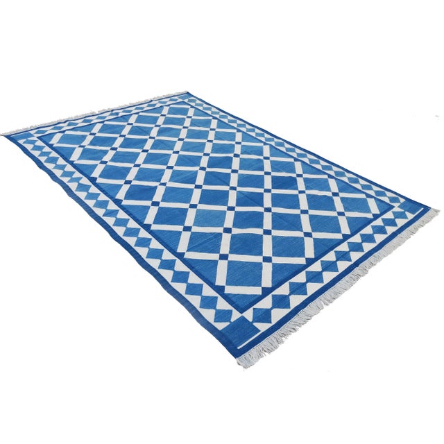 Cotton Vegetable Dyed Blue, Sky Blue And White Striped Reversible Rug These special flat-weave dhurries are hand-woven...