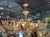 Metal French Maison Bagues Gilt Tole and Crystal Flower Chandelier For Sale - Image 7 of 8