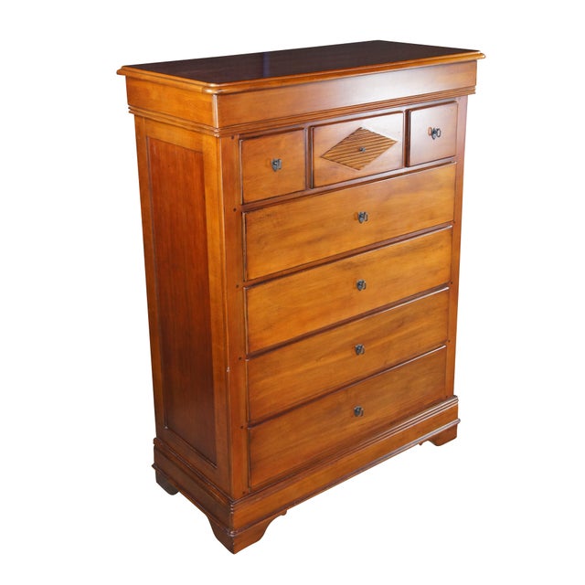Enhance your bedroom with this exquisite, early 21st century vintage tall chest of drawers crafted by the renowned...
