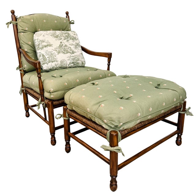 A classic two-piece Country French ladderback armchair and matching ottoman set by Calico Corners. Features substantial,...