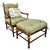 A classic two-piece Country French ladderback armchair and matching ottoman set by Calico Corners. Features substantial,...