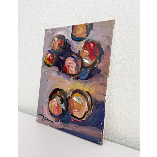 Original still life oil on canvas, artist signed. Depicts abstracted peaches on mauve and yellow background. Features...