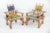Pair of vintage primitive Adirondack captain's chairs. Handcrafted from natural split round logs, these structurally rock-...