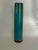 A striking vintage studio pottery vase featuring an elegant, elongated cylindrical silhouette and a richly variegated...